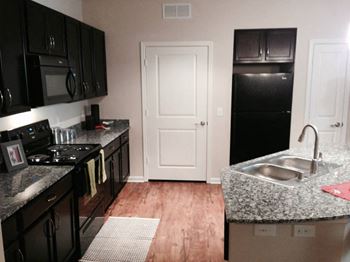Updated Kitchen With Black Appliances at Hurstbourne Estates, Kentucky, 40223
